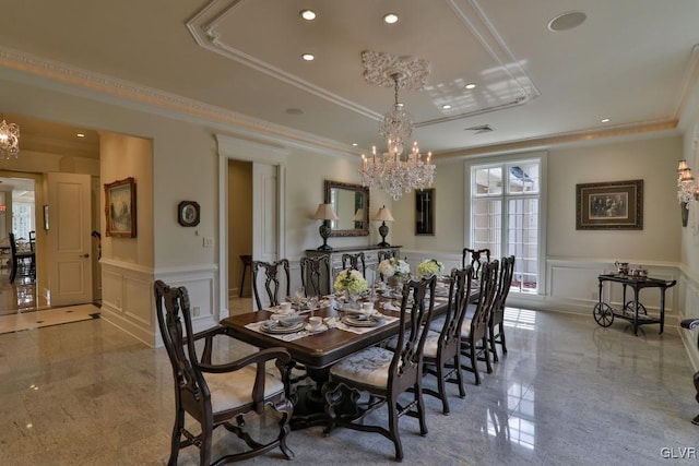 dining room featuring crown molding and an inviting chandelier