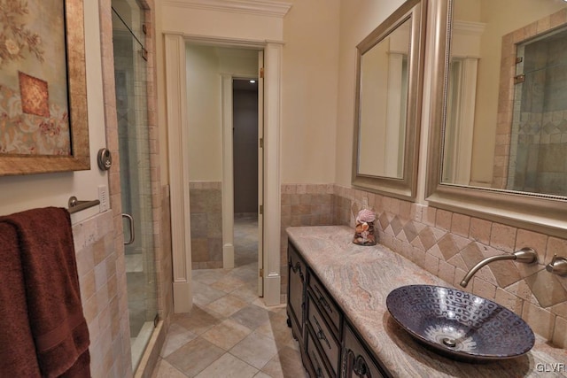 bathroom with vanity, tile patterned floors, and an enclosed shower