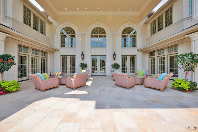 view of patio / terrace featuring an outdoor living space and french doors