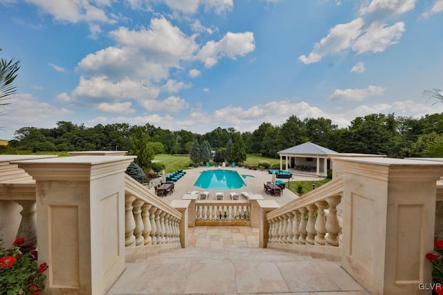 view of pool featuring a patio area