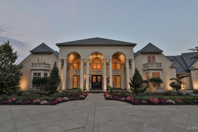 mediterranean / spanish-style house featuring french doors