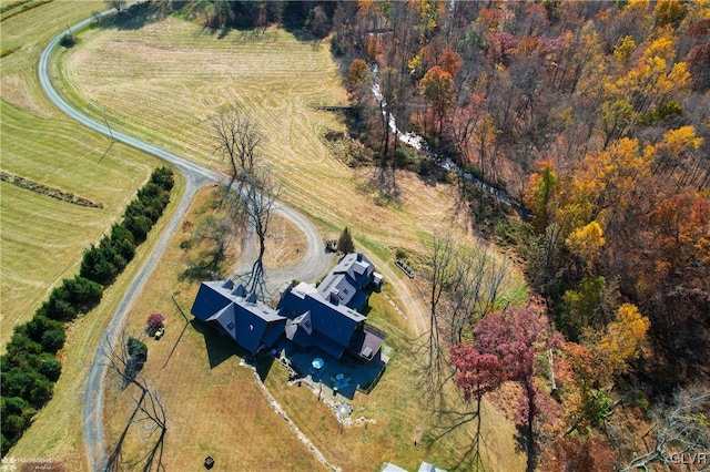 birds eye view of property featuring a rural view