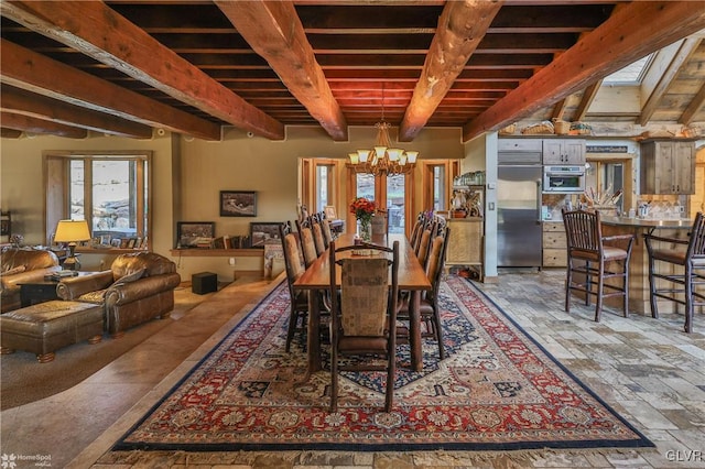 dining space featuring a notable chandelier and beamed ceiling