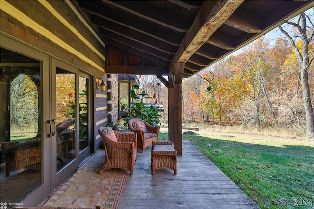 view of patio featuring french doors and a wooden deck