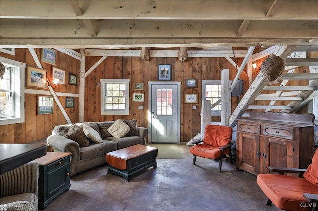 living room with wooden walls