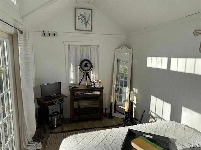 bedroom with lofted ceiling and dark hardwood / wood-style flooring