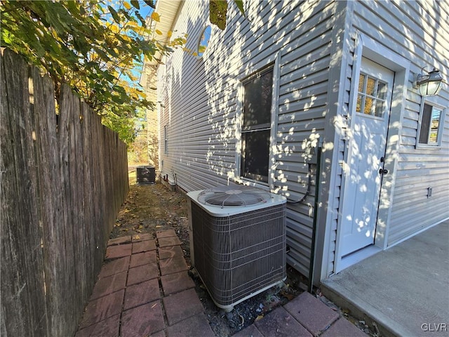 view of home's exterior with central air condition unit