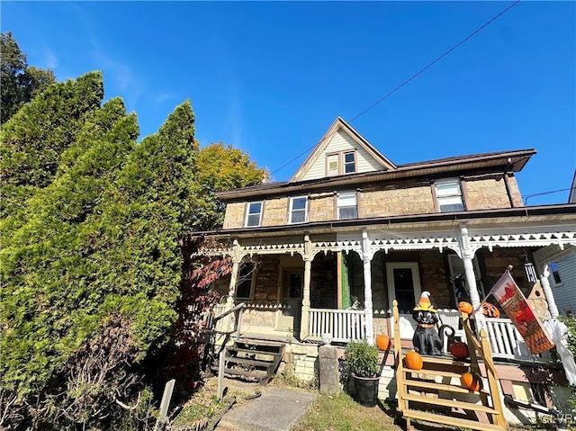 view of front of home featuring covered porch