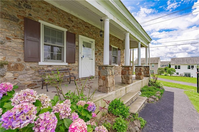 property entrance with a porch