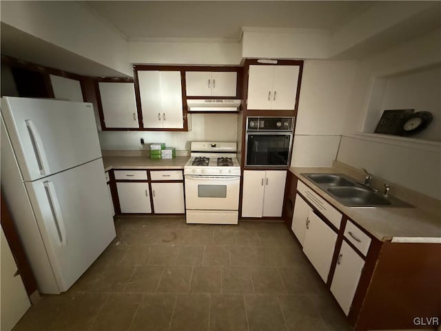 kitchen featuring white cabinetry, ornamental molding, sink, and white appliances