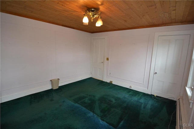 162 S Union St, Easton, PA 18042 - spare room with wood ceiling, dark colored carpet, and baseboard heating