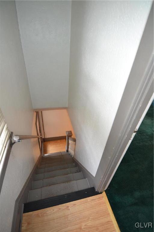 162 S Union St, Easton, PA 18042 - stairs featuring baseboards