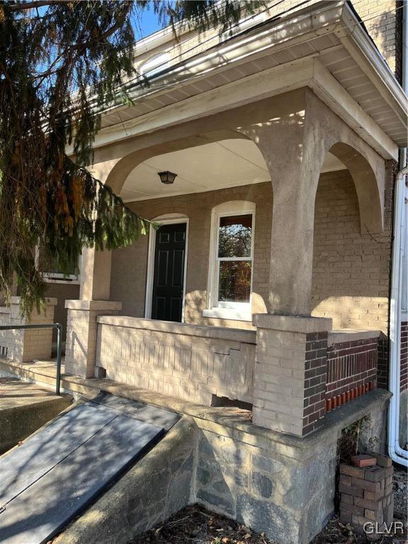 162 S Union St, Easton, PA 18042 - doorway to property with covered porch