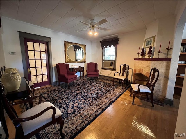162 S Union St, Easton, PA 18042 - living area with hardwood / wood-style flooring, ceiling fan, cooling unit, and a fireplace