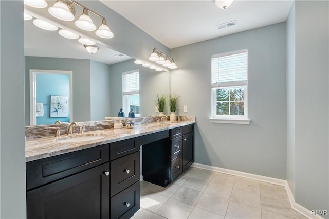 bathroom featuring vanity and tile patterned flooring