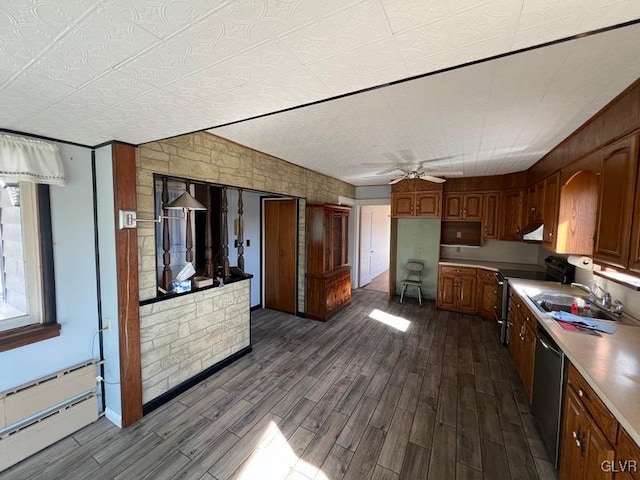 kitchen featuring dark hardwood / wood-style flooring, stainless steel dishwasher, baseboard heating, and electric range