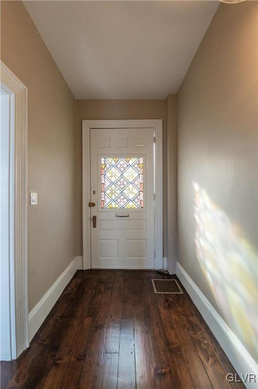 doorway to outside with dark hardwood / wood-style flooring