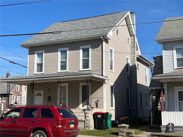 view of front of property featuring covered porch