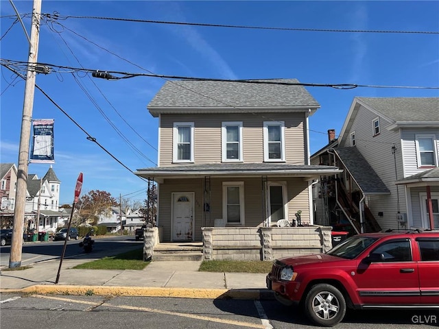 front facade with a porch