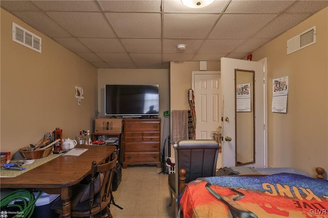 bedroom with a drop ceiling