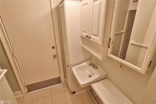 22 S 13th St, Allentown City, PA 18102 - bathroom featuring a sink and tile patterned flooring