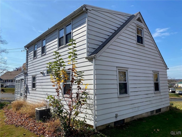 view of property exterior with central AC unit