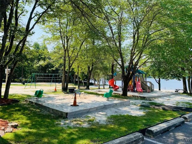 surrounding community featuring a playground