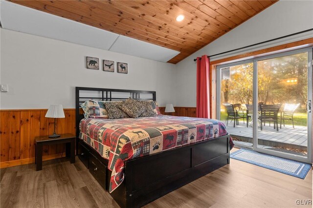 bedroom with wooden ceiling, access to exterior, lofted ceiling, and hardwood / wood-style flooring