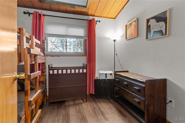 interior space with wood ceiling and hardwood / wood-style floors