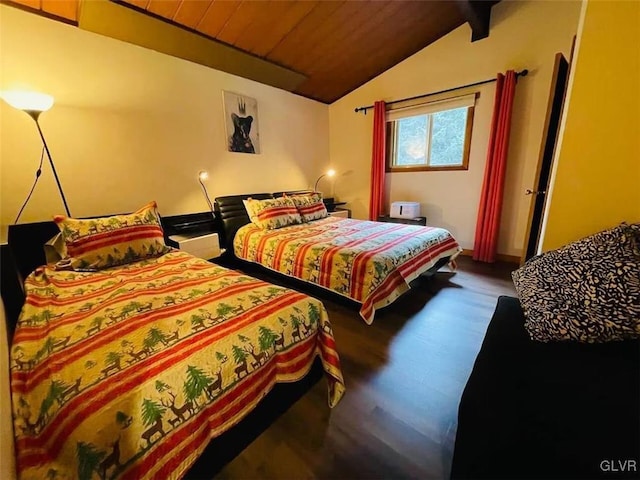 bedroom with vaulted ceiling with beams, dark hardwood / wood-style flooring, and wooden ceiling