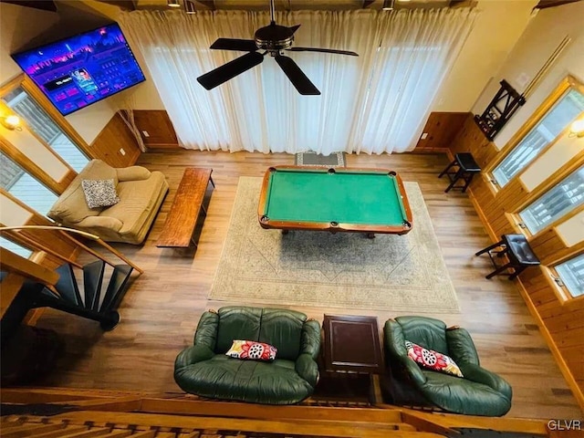 rec room with ceiling fan and hardwood / wood-style floors