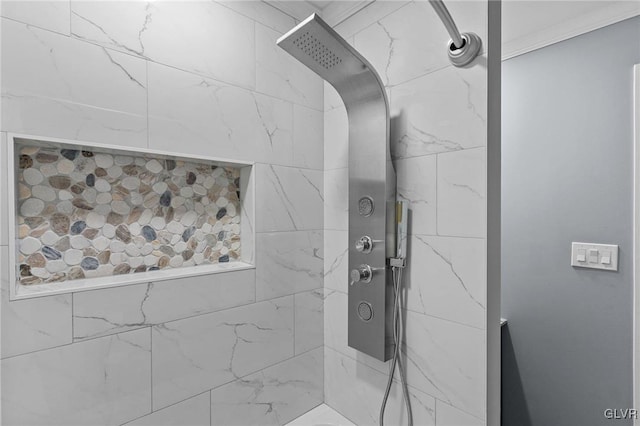 bathroom featuring tiled shower