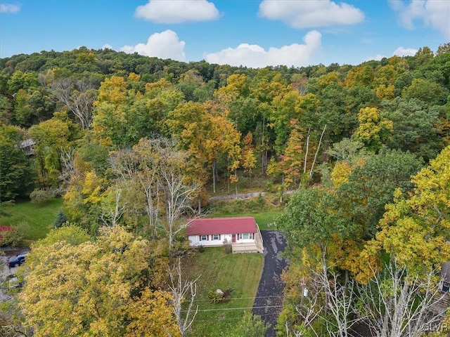 aerial view featuring a view of trees