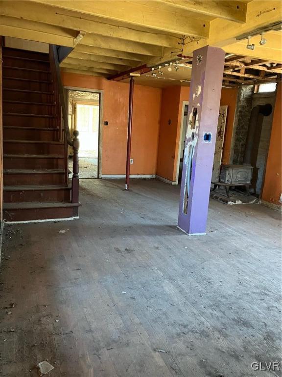 basement featuring hardwood / wood-style flooring