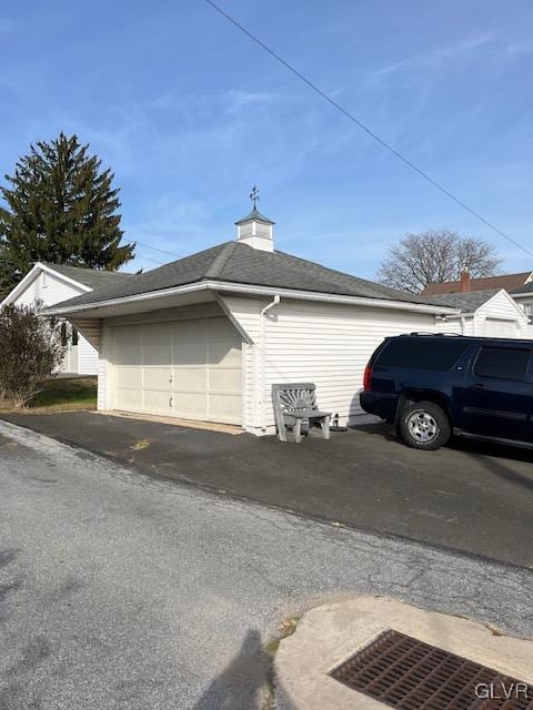 view of property exterior with a garage