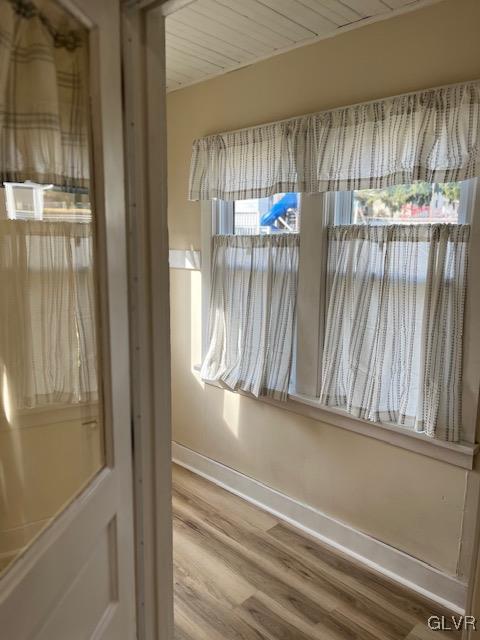 doorway to outside with hardwood / wood-style flooring