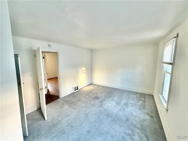 view of carpeted spare room