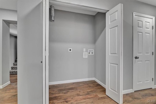 laundry area with washer hookup, electric dryer hookup, and hardwood / wood-style flooring