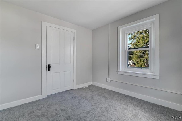 empty room featuring carpet