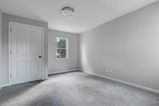 empty room with carpet floors