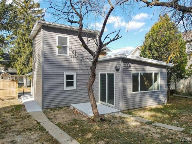 rear view of house featuring a patio