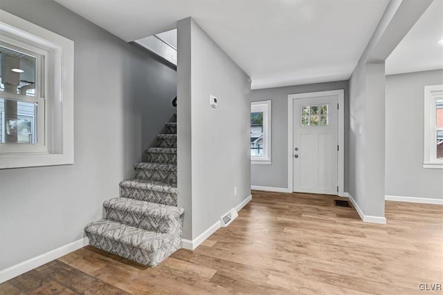 entrance foyer with light hardwood / wood-style floors