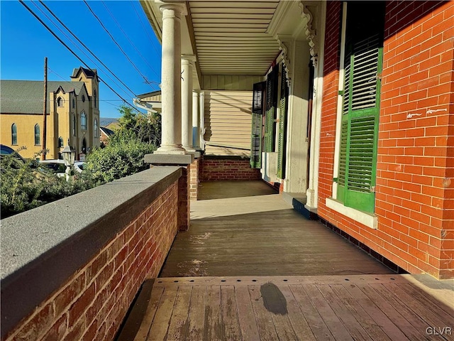 balcony featuring covered porch