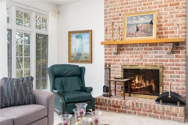 interior space with a brick fireplace