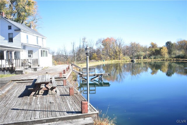 view of dock featuring a water view