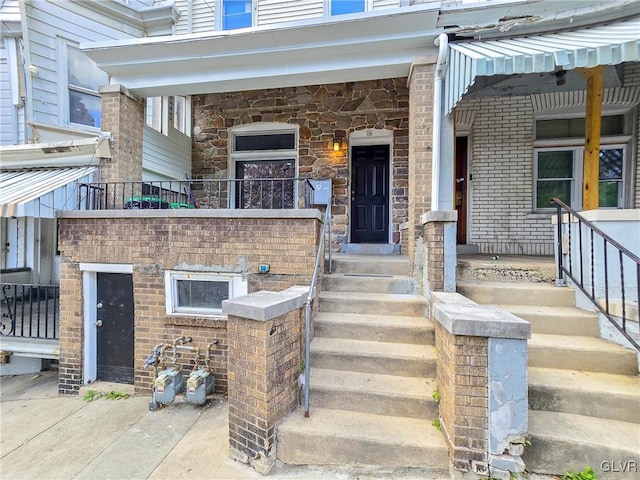 entrance to property with a porch