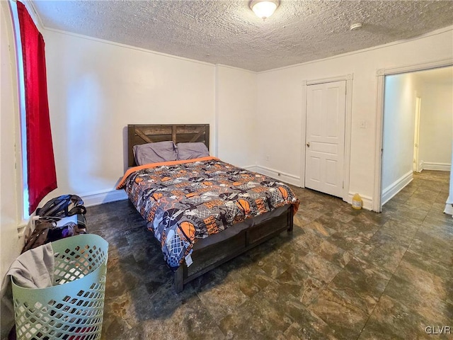 bedroom featuring a textured ceiling