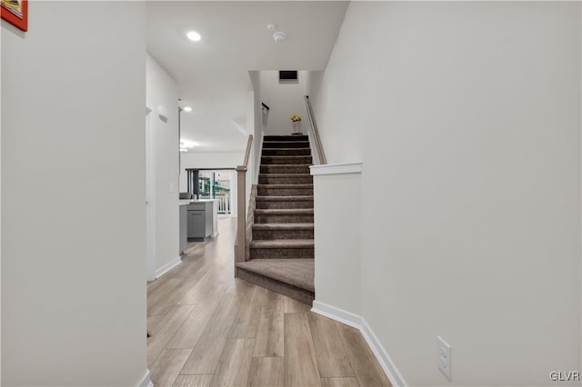 hall featuring light hardwood / wood-style floors