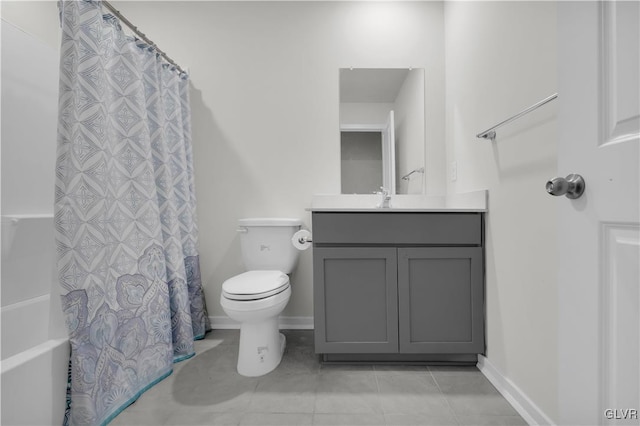 full bathroom with tile patterned floors, vanity, toilet, and shower / tub combo with curtain