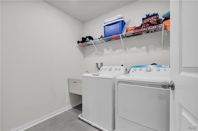 laundry room featuring separate washer and dryer